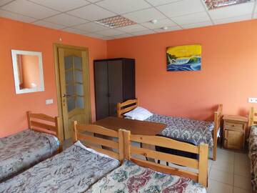 Кровать в общем номере для мужчин и женщин с 5 кроватями. в  Хостел Гео